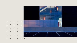Man entering building containing data center.